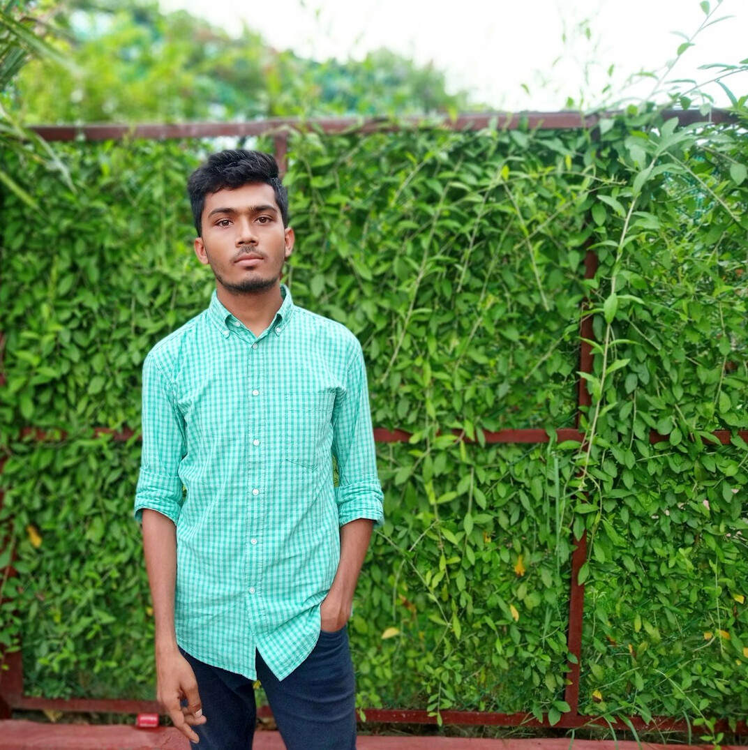 Portrait of a smiling young man in a casual shirt